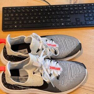 Nike Free Women Athletic Shoes with Black White W/ Orange Accents Size 9.5